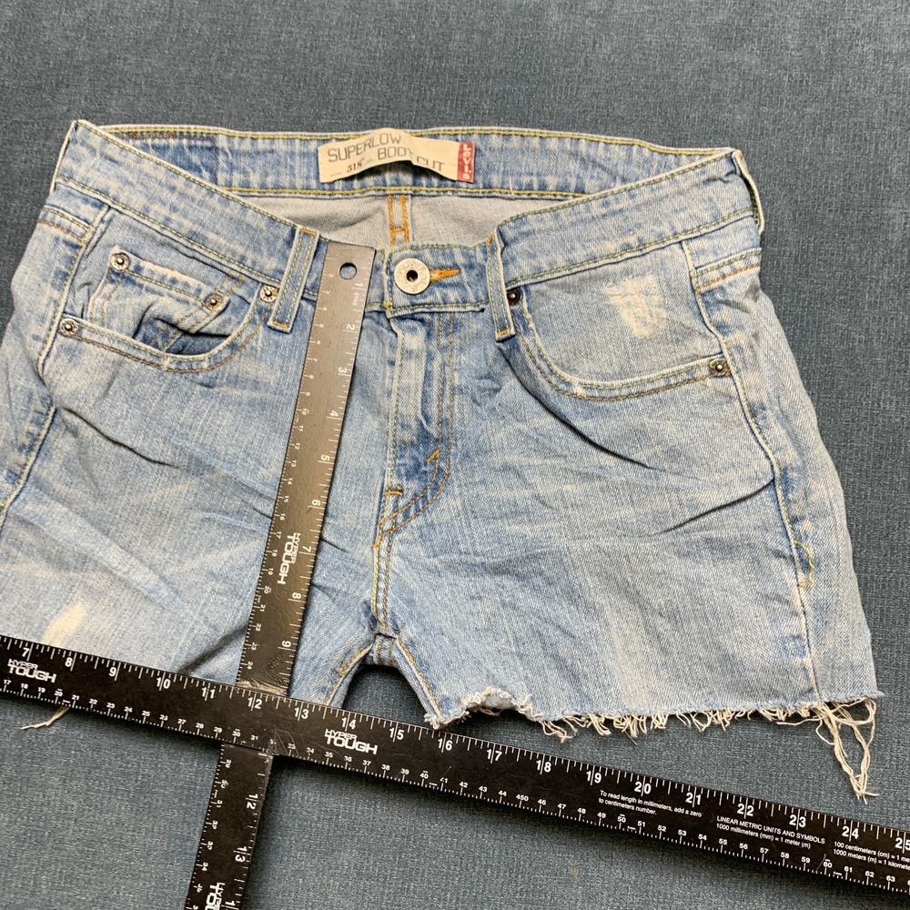 Levi's 518 Superlow Cut Off Shorts Womens Blue Denim Light Wash Red Tab Raw Hem - Picture 7 of 15